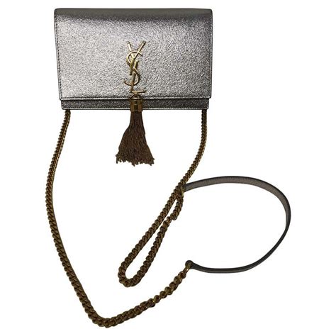 ysl bag with silver tassel|YSL crossbody bag with tassel.